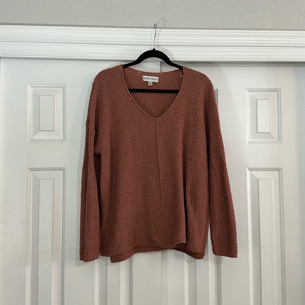 V neck sweater.